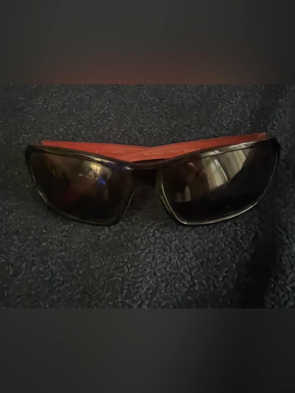 Fossil Black Sunglasses with Red Interior Accent
